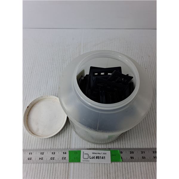 Can of Blue Plastic Belt Buckles