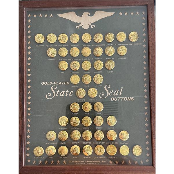 A full tray of brass State Seal buttons