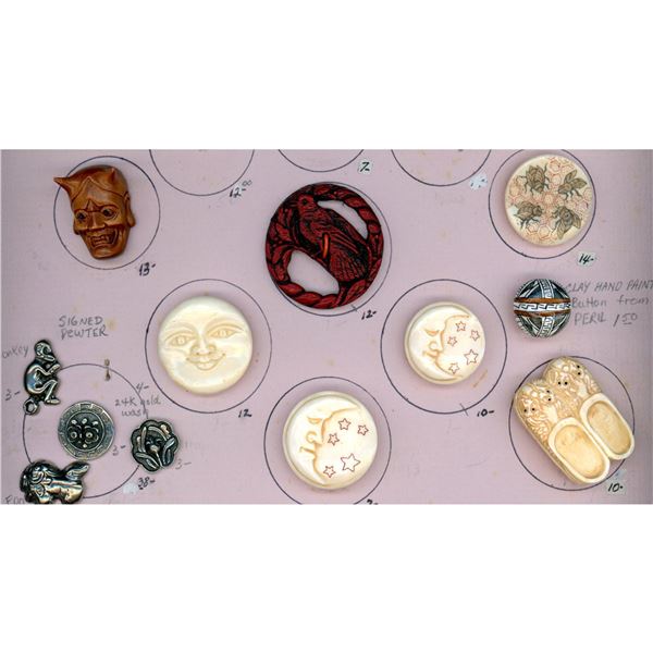 A small card of division 1 and 3 Asian themed buttons