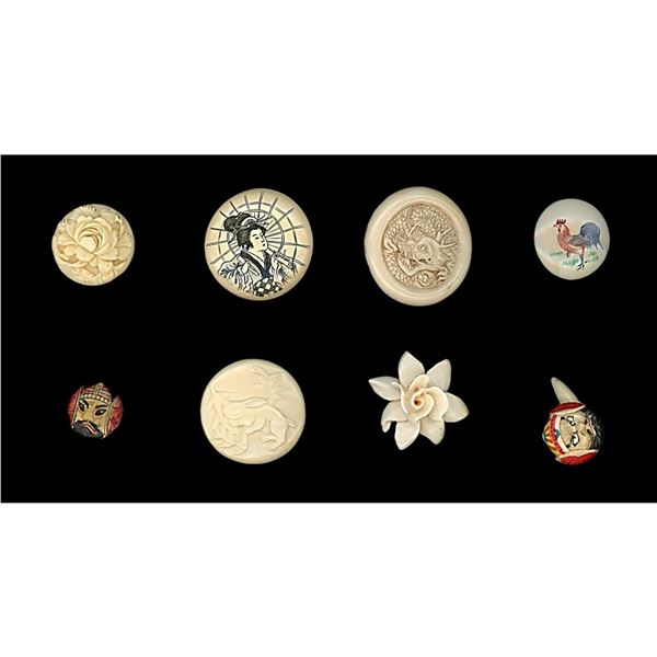 A small card of division three carved bone buttons