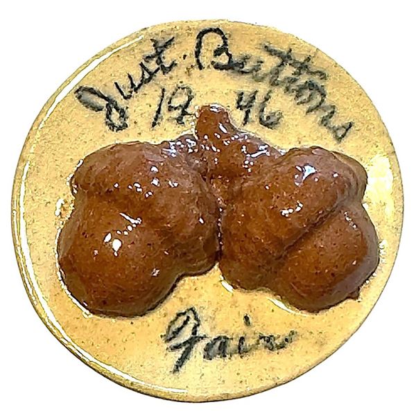 A rare Studio artist ceramic pictorial button