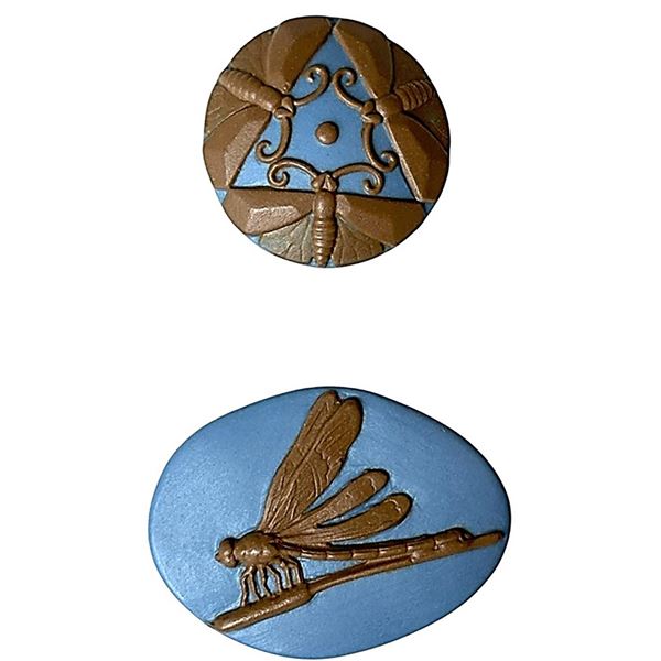 A small card of division three Studio artist buttons