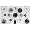 A partial card of division one assorted enamel buttons