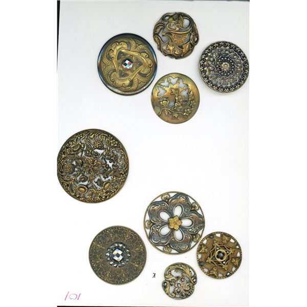 A small card of division one mostly pierced buttons