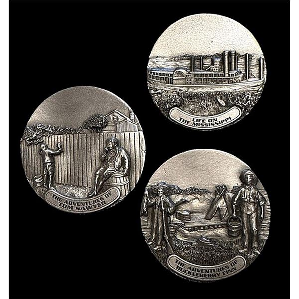 A small card of division three pictorial pewter buttons