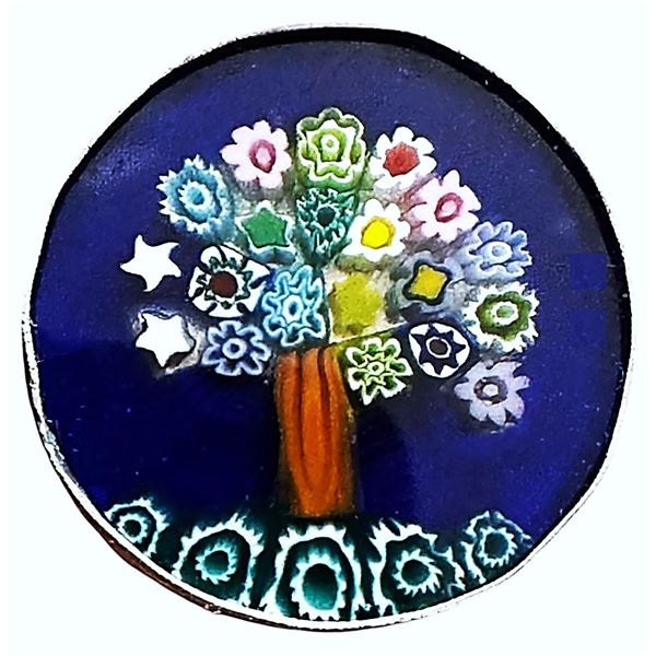 An unusual division three inlayed glass button