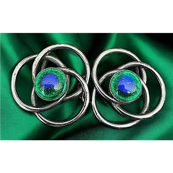 A division one glass set in metal buckle