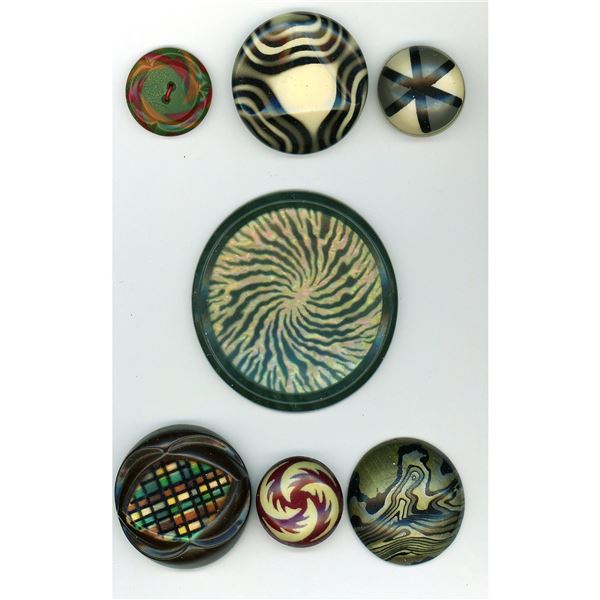 A small card of division 1 & 3 celluloid buttons