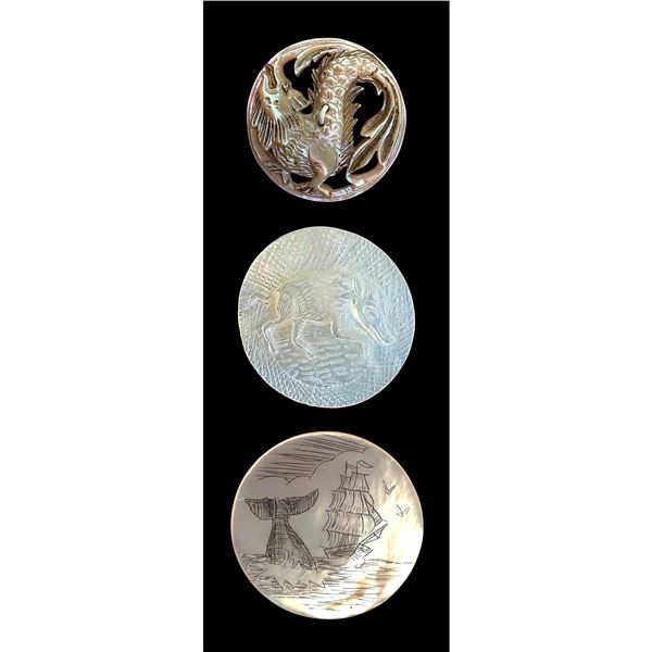 A small card of division one and three pearl buttons