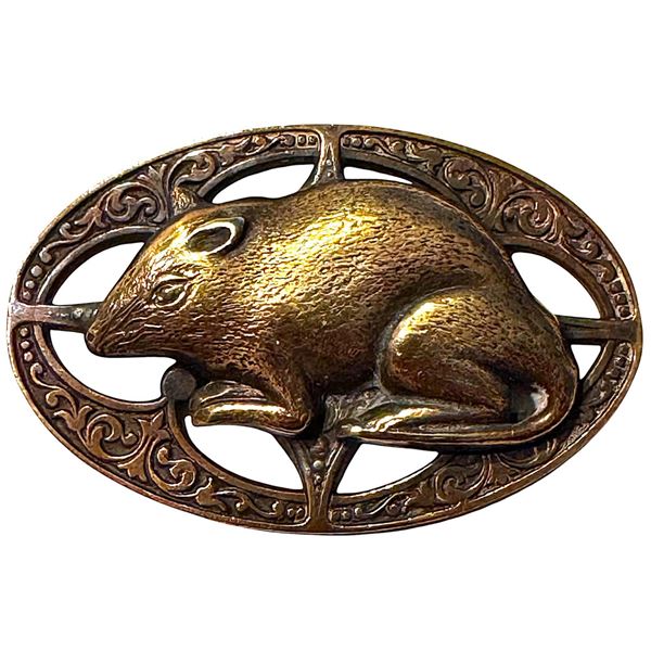 A division one openwork pictorial animal button