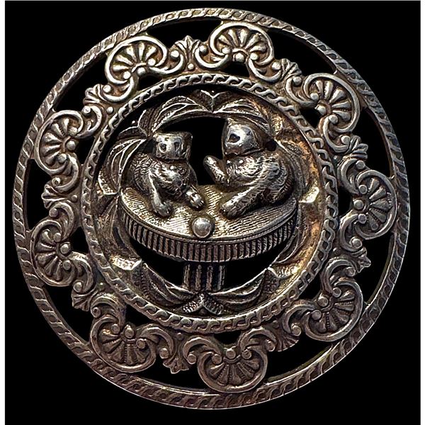 A division one pierced openwork animal button