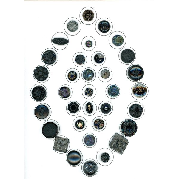 A card of assorted division one black glass buttons