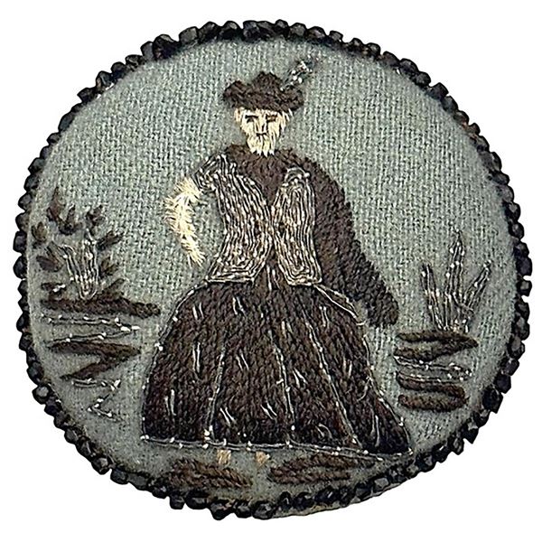 A RARE division one pictorial fabric button