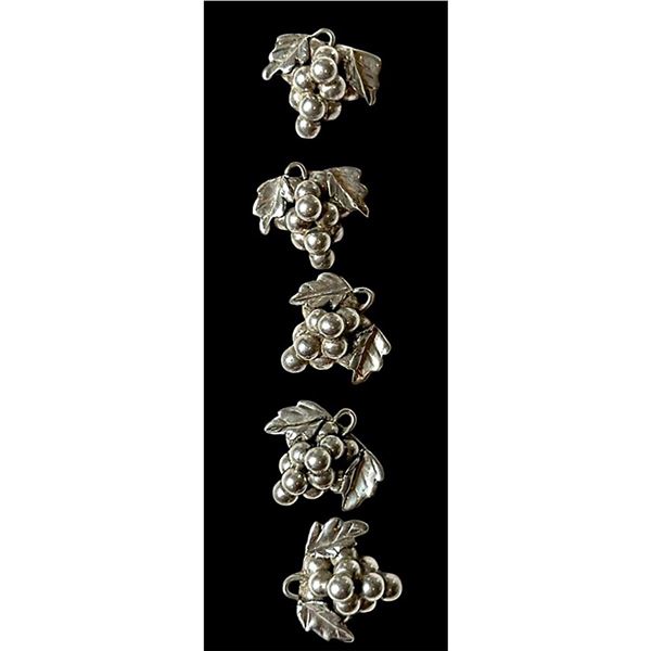 A small card of division three Mexican silver buttons