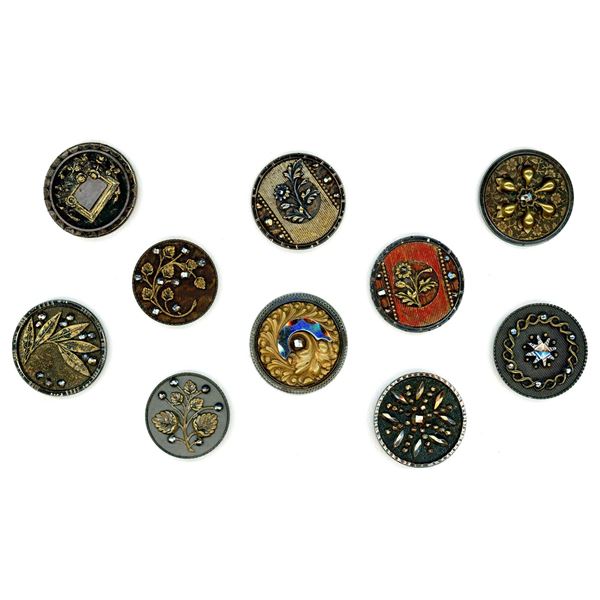 A partial card of division one steel cup buttons
