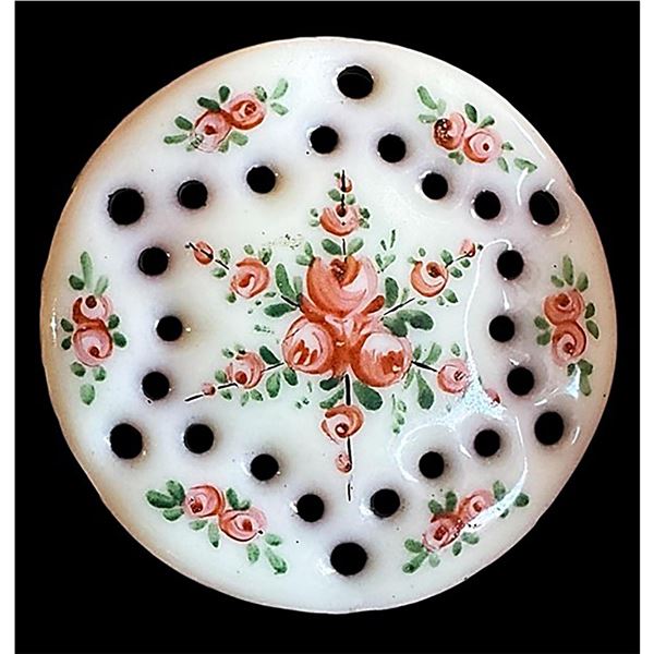 A division one unusual pierced enamel button