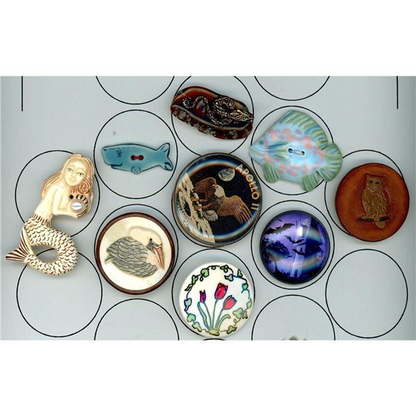 A partial card of division 3 assorted material buttons