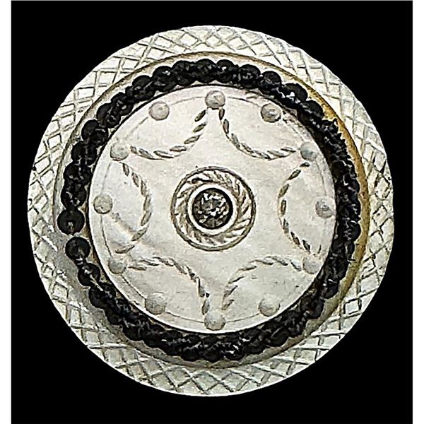 A rare division one engraved white pearl button