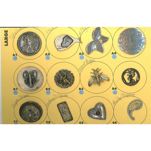 A partial card of division 1 & 3 metal buttons