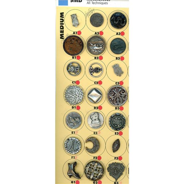 A partial card of division 1 & 3 metal buttons