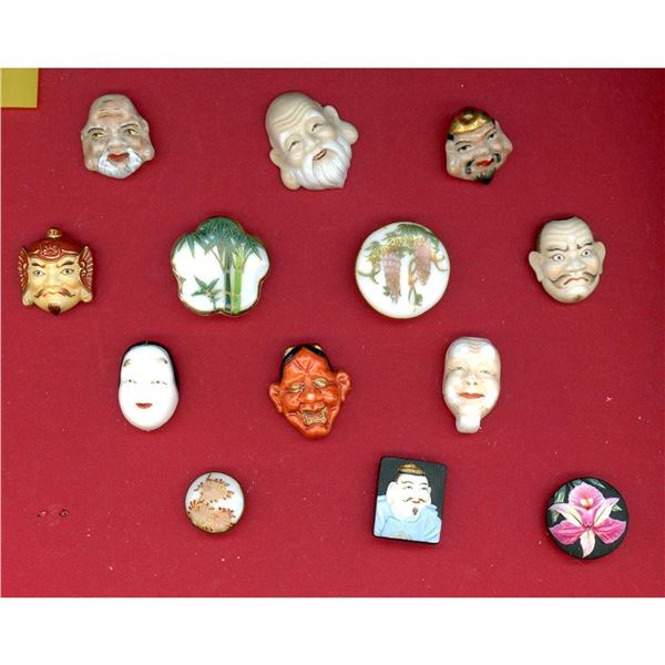 A small card of division three Asian themed buttons