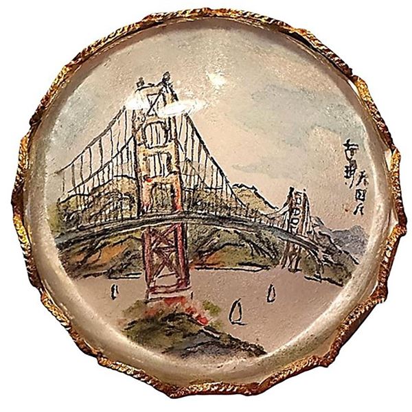 A division three reverse painted glass in metal button