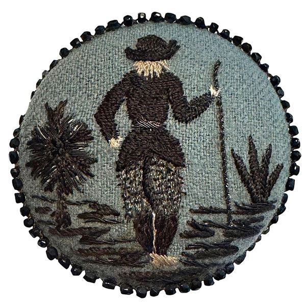A RARE division one pictorial fabric button