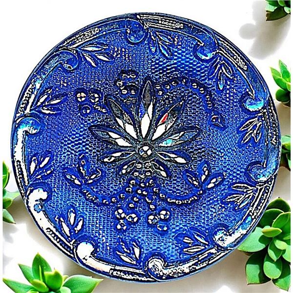 A division one silver lustered lacy glass button
