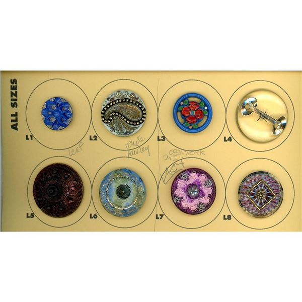 A small card of division 1 & 3 glass buttons