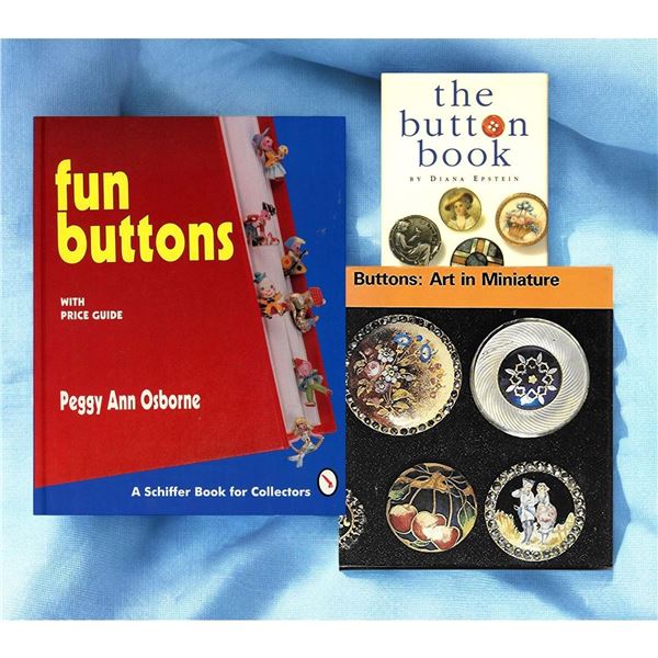 A group of 3 books on Buttons