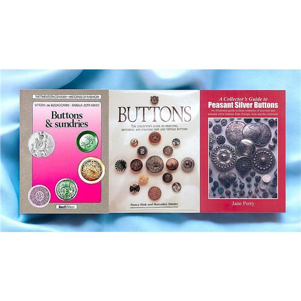 A group of 3 Button Books