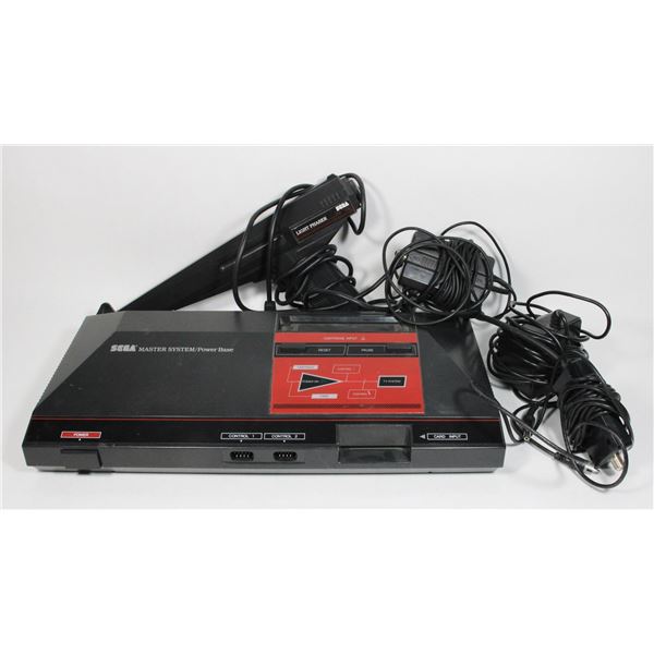 #356 SEGA MASTER SYSTEM W/ CORDS TURNS ON FOR