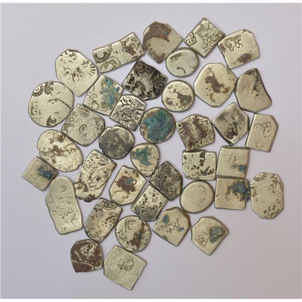 Large Lot: A group of 38 Ancient Magadhan silver punch-mark coins, various symbols and types. (38 co