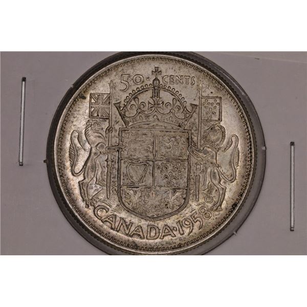 1958 CANADA SILVER 50 CENT .3 OZ. ASW TONED