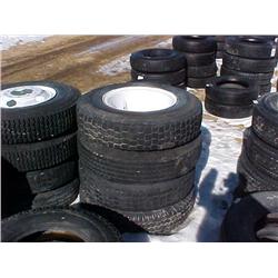 (4) 10.00 - 22 TIRES (ON WHEELS)