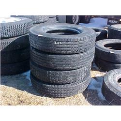 (4) 10.00 - 22. TIRES (ON WHEELS