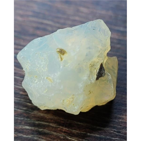 26)  NATURAL 5 CT ROUGH ETHIOPEAN FIRE OPAL.
