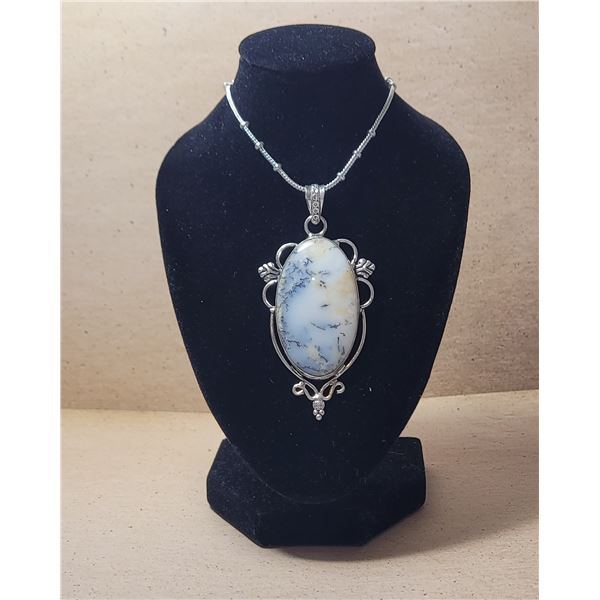 17)  NATURAL OVAL DENDRITE OPAL ON 18" CHAIN.