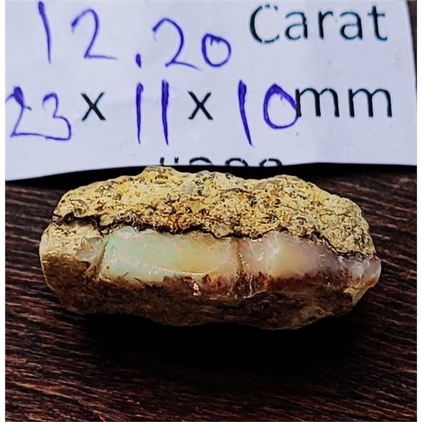 28)  NATURAL 12.2 CT ROUGH WHITE FIRE ETHIOPEAN