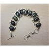 Image 2 : 18)  TIBETAN SILVER AND OVAL NATURAL