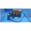 Image 1 : Vintage binoculars in leather case made by Bushnell