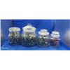 Image 1 : 4 glass jars filled with marbles