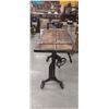 Image 2 : Stunning restored antique tilt adjustable cast iron table with custom steampunk top, 50" x 23" x 37"