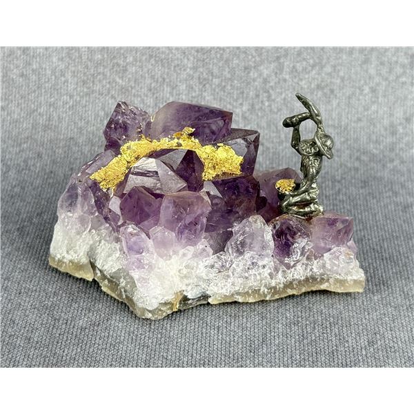 Prospector Miner on Amethyst Crystal