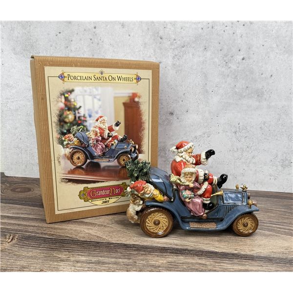 Grandeur Noel Porcelain Santa on Wheels