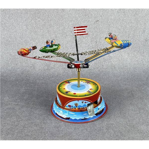 Tin Litho Rocket Ride Carousel Toy