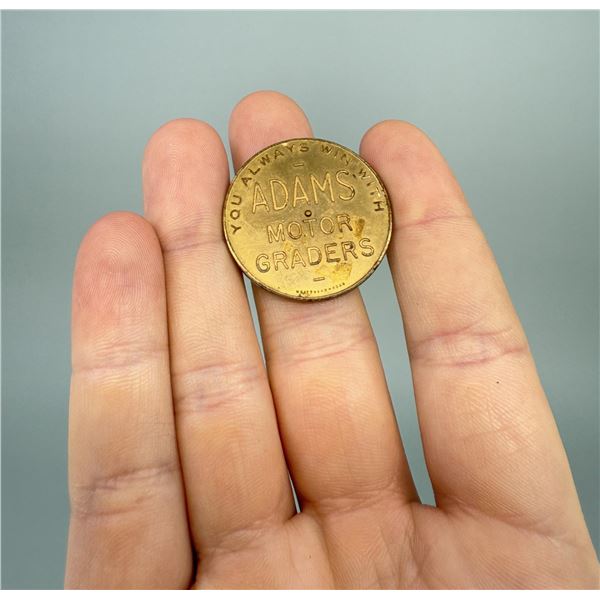 Adams Motor Graders Spinner Trade Token