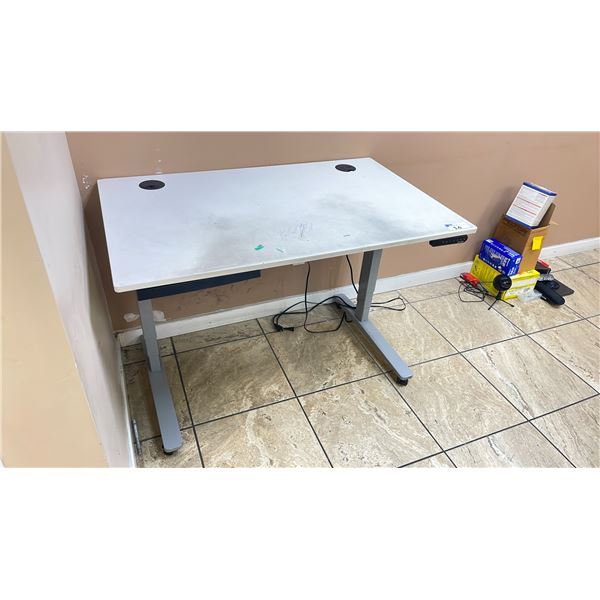 WHITE ADJUSTABLE  ROLLING  TABLE WITH ELECTRICAL APPLICATIONS