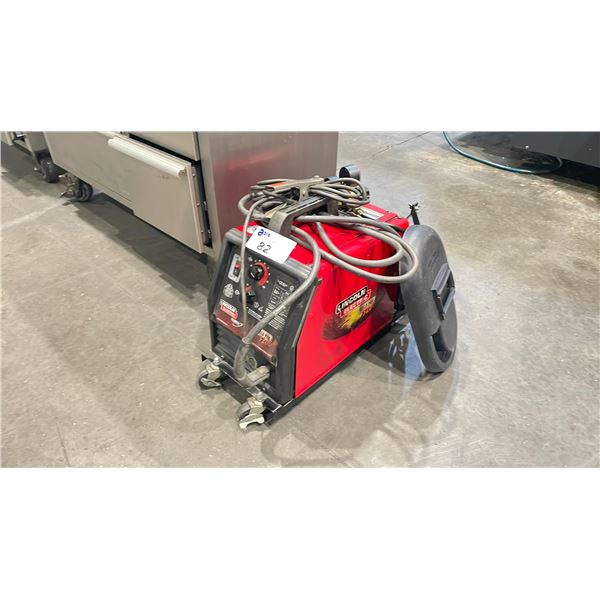 RED LINCOLIN ELECTRIC WELDER WELD PAK 3200HD WIRE FEED WITH STINGER GROUND CABLE AND GAUGES. AN