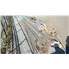 Image 1 : 2 PILES OF ASSORTED WOOD OUTSIDE SHOP IN BACK AND PATIO TABLE AND CHAIRS